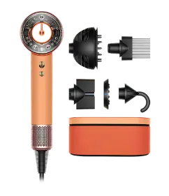 Beispielhafter Lieferumfang des Dyson Supersonic Nural mit Gerät, Aufsätzen und Präsentationsbox